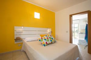 Una cama o camas en una habitación de Al Ficodindia