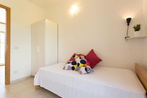 Una cama o camas en una habitación de Al Ficodindia