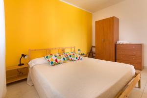 Una cama o camas en una habitación de Al Ficodindia