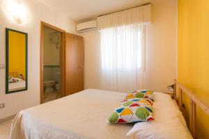 Una cama o camas en una habitación de Al Ficodindia