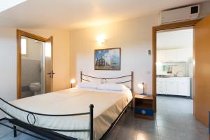 Una cama o camas en una habitación de Al Ficodindia