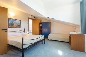 Una cama o camas en una habitación de Al Ficodindia