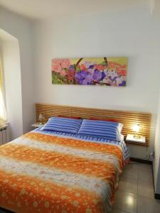 Ліжко або ліжка в номері Riva Trigoso Mare