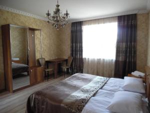 Postel nebo postele na pokoji v ubytování Guest House Tamta