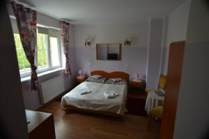 Postel nebo postele na pokoji v ubytování Floryda Jurata