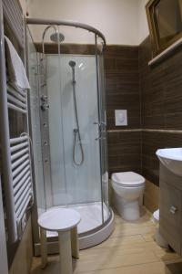 Kylpyhuone majoituspaikassa Hotel Busignani