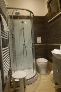 Koupelna v ubytování Hotel Busignani + 37 fotografií