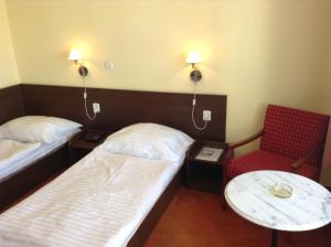 Postel nebo postele na pokoji v ubytování Hotel YORK