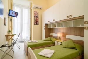 Posteľ alebo postele v izbe v ubytovaní Sarracino Relais