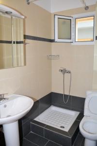 Koupelna v ubytování VILLA TASOS