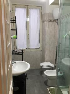 Koupelna v ubytování VINILE