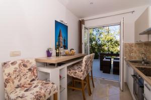 Kuchyň nebo kuchyňský kout v ubytování Apartment Sandra