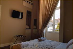 A bed or beds in a room at Villa Cua