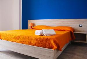 Postel nebo postele na pokoji v ubytování Bed Ponente