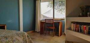 Postel nebo postele na pokoji v ubytování Ananda Guesthouse