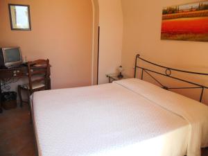 Voodi või voodid majutusasutuse B&B Macrina toas