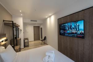 Et tv og/eller underholdning på Sette Suites & Rooms - Adults Only