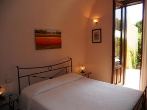 Voodi või voodid majutusasutuse B&B Macrina toas