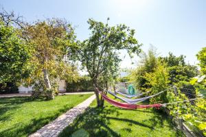 Vonkajšia záhrada v ubytovaní Gaia apartments