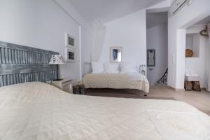 Postel nebo postele na pokoji v ubytování Gaia apartments