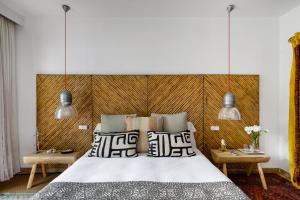 Llit o llits en una habitació de Chambao Suite Marbella