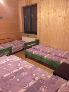 Ένα ή περισσότερα κρεβάτια σε δωμάτιο στο Lodging Vidmar