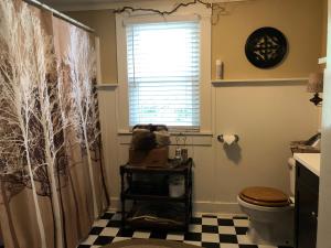 Ванна кімната в Magnolia House & Gardens B&B