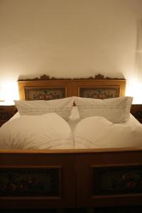 Łóżko lub łóżka w pokoju w obiekcie Apartments HAUS SCHÖN - Preise inclusive Pitztal Sommer Card