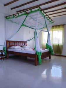 Letto o letti in una camera di Simba House