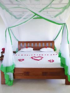 Letto o letti in una camera di Simba House
