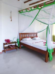 Letto o letti in una camera di Simba House