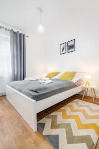 Posteľ alebo postele v izbe v ubytovaní Gold Apartments Your Holiday Home RODZINNY 3