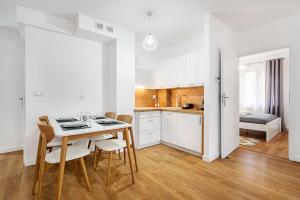 Kuchyňa alebo kuchynka v ubytovaní Gold Apartments Your Holiday Home RODZINNY 3