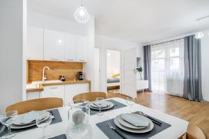 Kuchyňa alebo kuchynka v ubytovaní Gold Apartments Your Holiday Home RODZINNY 3
