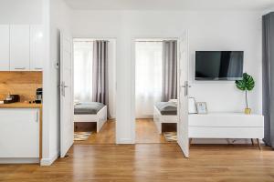 Kuchyňa alebo kuchynka v ubytovaní Gold Apartments Your Holiday Home RODZINNY 3