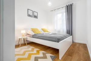 Posteľ alebo postele v izbe v ubytovaní Gold Apartments Your Holiday Home RODZINNY 3