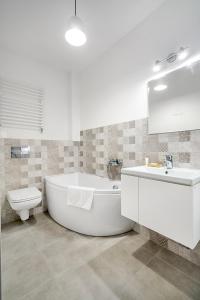 Kúpeľňa v ubytovaní Gold Apartments Your Holiday Home RODZINNY 3