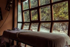 Cama ou camas em um quarto em Casa del Sol Machupicchu