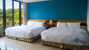 Postel nebo postele na pokoji v ubytování Toptai Homestay