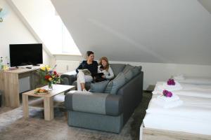 TV o dispositivi per l'intrattenimento presso Hotel am Waldschlösschen - Brauhaus