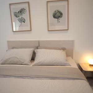 Un pat sau paturi într-o cameră la Nornnuea @ Inthanon