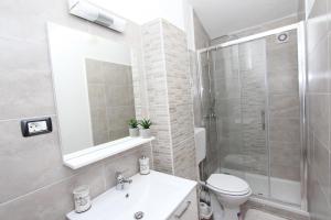 Koupelna v ubytování Guest House Milotic + 20 fotografií