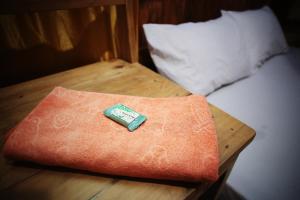 Giường trong phòng chung tại Mama Tia Family Homestay