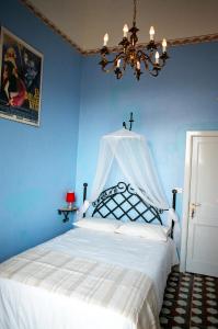 Posteľ alebo postele v izbe v ubytovaní 5 Balconi B&B