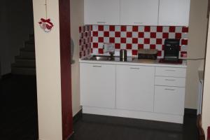 A kitchen or kitchenette at Un Posto Al Sole