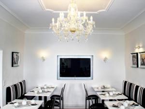 TV a/nebo společenská místnost v ubytování Hotel Linde