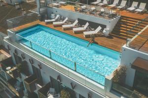 Poolen vid eller i närheten av Lagos Avenida Hotel
