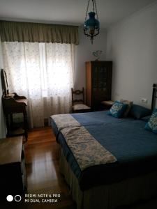 Ліжко або ліжка в номері Villarei