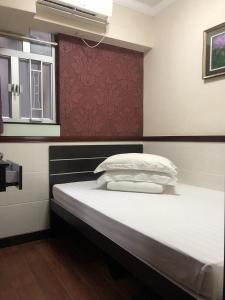 Cama o camas de una habitación en Hang Fung Hostel