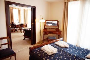 Posteľ alebo postele v izbe v ubytovaní Qubus Hotel Wrocław